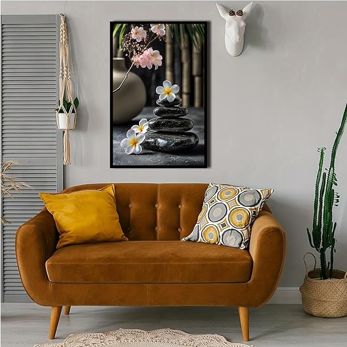 A harmonious black stone stack paired with white and pink flowers bamboo and ceramic vases creates a tranquil Zen decor for minimalist homes and mindful spaces 16x24in Metal blackFramed