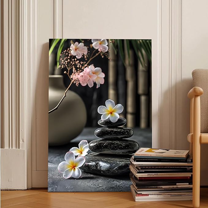 A harmonious black stone stack paired with white and pink flowers bamboo and ceramic vases creates a tranquil Zen decor for minimalist homes and mindful spaces 20x30in Wood Framed