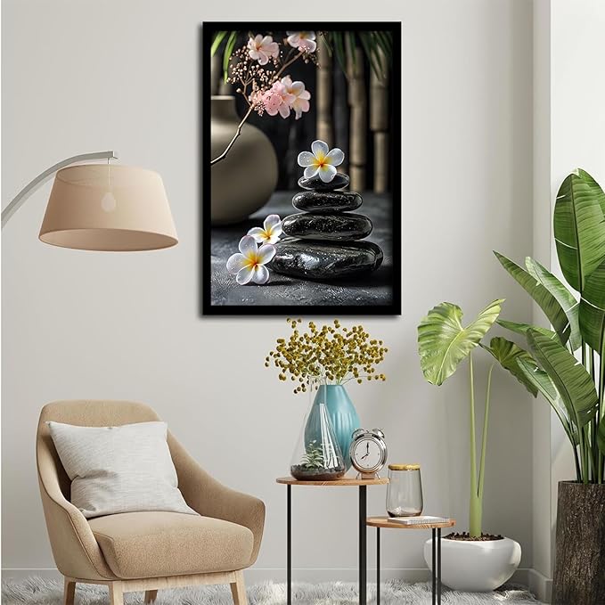 A harmonious black stone stack paired with white and pink flowers bamboo and ceramic vases creates a tranquil Zen decor for minimalist homes and mindful spaces 16x24in Metal blackFramed