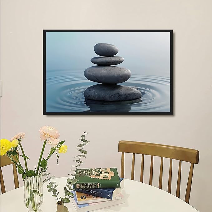 Zen wall art Harmonious grey stones stacked on a calm surface of water Serene Zen decor suitable for tranquil homes and spaces of meditation 24x36in Metal blackFramed